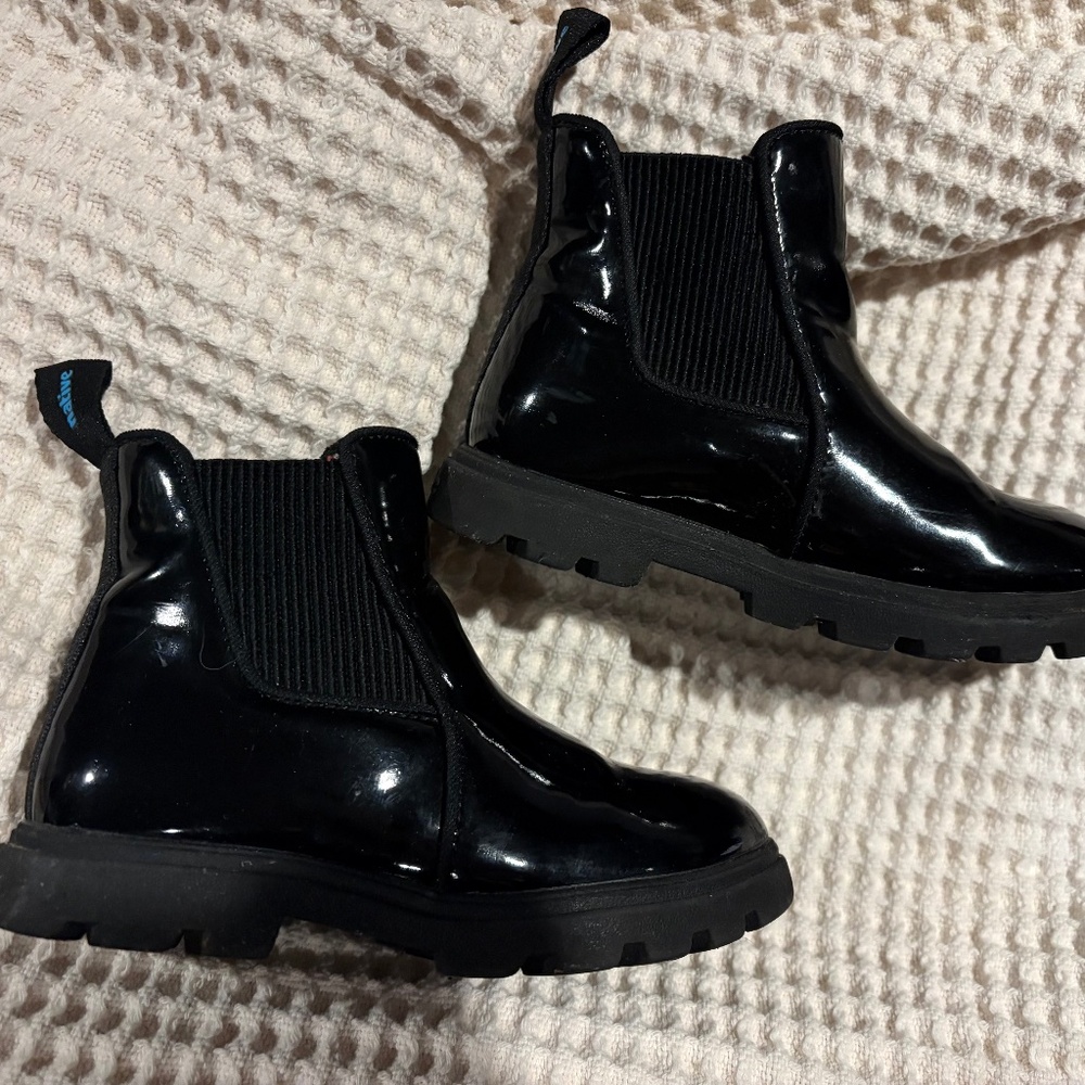 Black patent leather toddler boots by Native